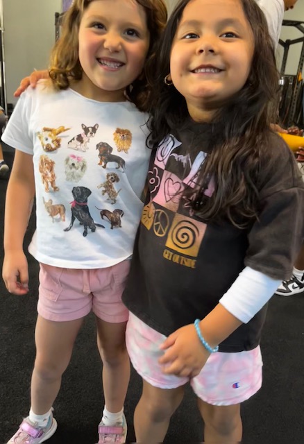 Two young girls friends at Power Play PE Little Movers Sacramento