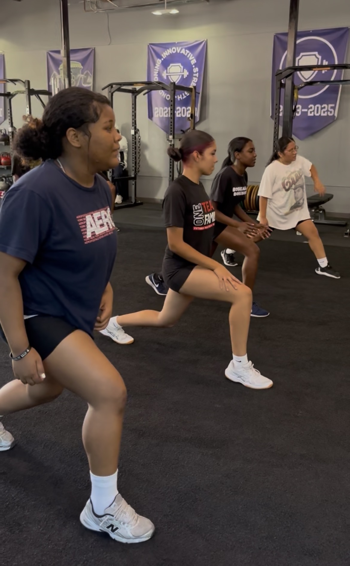 Teen group doing bodyweight lunges in sync at ISC Sacramento