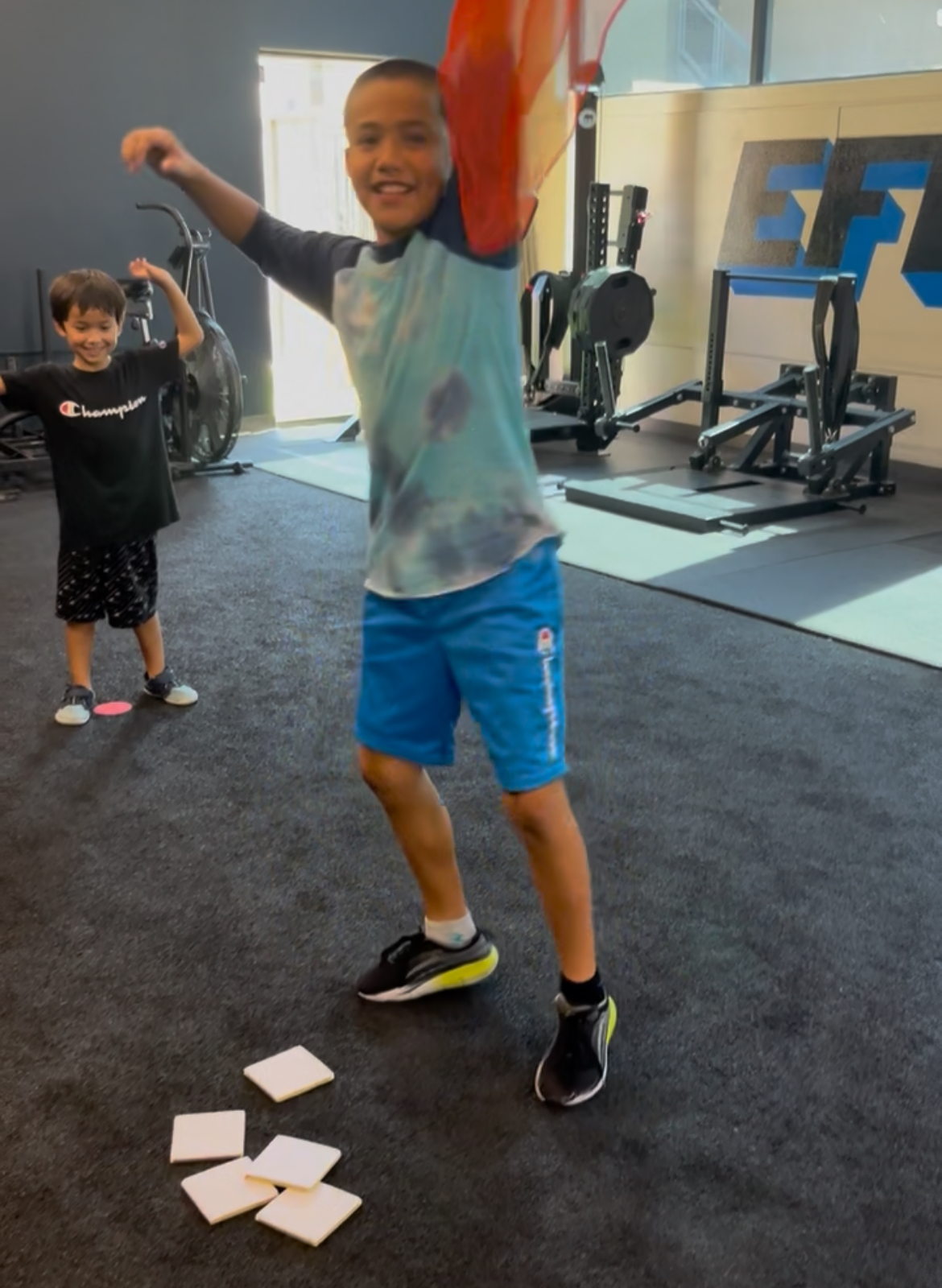 Kid celebrating achievement at homeschool PE class in Sacramento