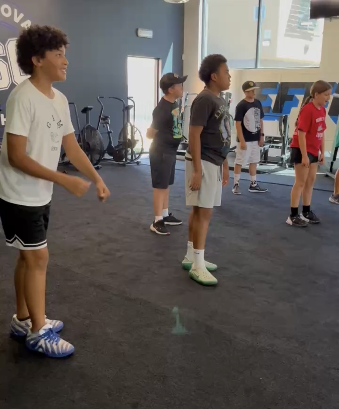 Homeschool teens warming up together at Power Play PE